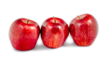 tree apple stand together on white  background isolated