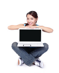 Woman student happy sitting with laptop