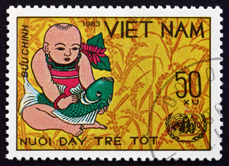 Postage stamp Vietnam 1983 Infant and Fish