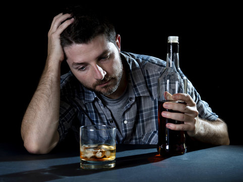 Alcoholic Drunk Man Drinking Whiskey In Alcoholism Concept