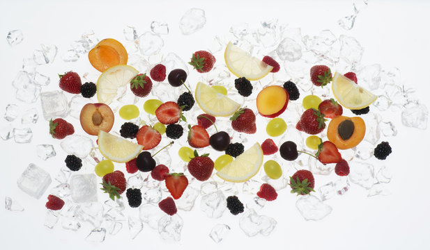 fruits with ice on white background