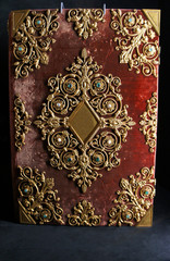 Old bound book with gold detail