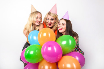 Joyful happy smiling young women on the party