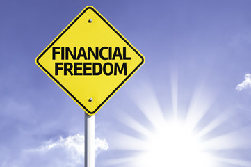 Financial Freedom road sign with sun background