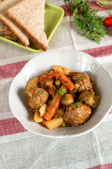Vegetable stew with meatballs and thick gravy