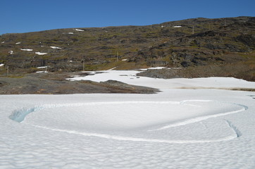 Collapsed snow patch in mountain