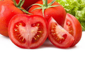 Red tomato and drops water close up