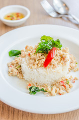Spicy fried chicken with basil and rice