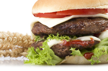 Sandwich big Hamburger close up on white