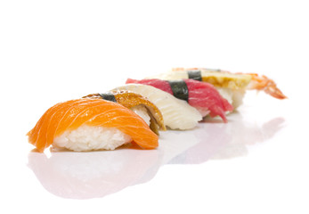Nigiri sushi made dish with shadow isolated on white background