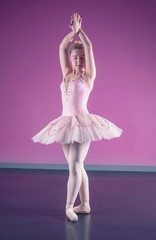 Graceful ballerina standing in fifth position © WavebreakMediaMicro