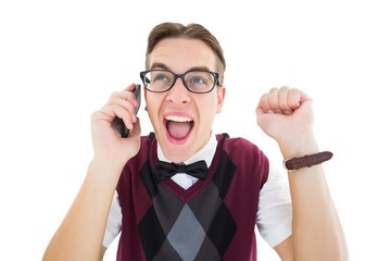 Excited geeky hipster talking on the phone