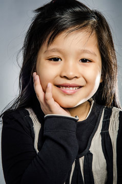 Portrait of little happy asian cute Girl