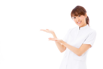 young asian nurse on white background