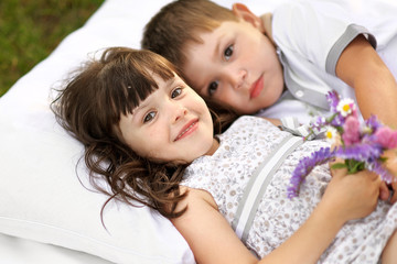 Portrait of a boy and girl in summer