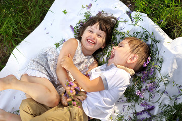 Portrait of a boy and girl in summer