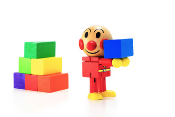 Wooden doll carry a rectangular box