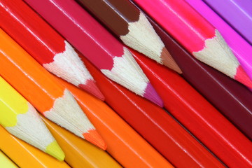 Crayons colored pencils front background