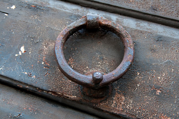 Old doorknob in the form of a steel ring