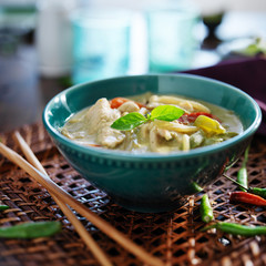 thai green curry with chicken in bowl