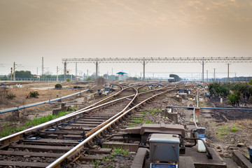 Railway in fog on station, outdoor landscape