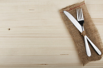knife and fork on a napkin