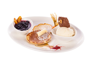 tasty sweet pancakes with vanilla icecream and topping