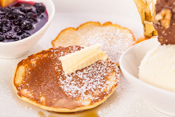 tasty sweet pancakes with vanilla icecream and topping