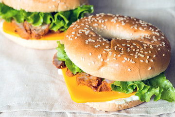 Bagel with fresh cheese and fresh lettuce