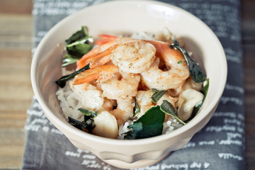Bowls of asian fried shrimp and rice