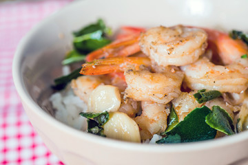 Bowls of asian fried shrimp and rice