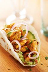 Mexican chicken taco with avocado
