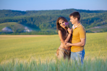 Young couple in wheat field