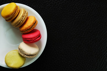 Colorful Macarons in the dish