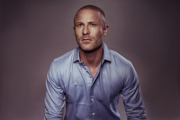 Fototapeta premium Handsome man looking thoughtfully at the camera