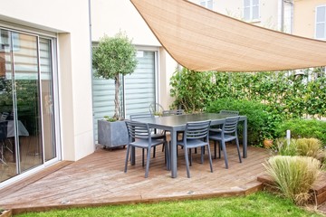 Modern terrace with dining table and chairs - obrazy, fototapety, plakaty