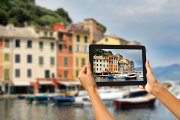 Portofino Woman taking pictures on a tablet