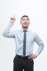 Junior handsome manager showing process of idea search