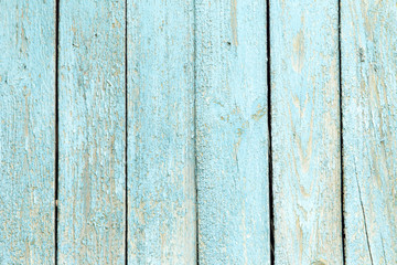 wooden background with old blue paint