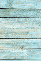 wooden background with old blue paint