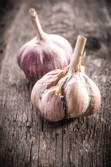garlic bulb on rustic wooden background