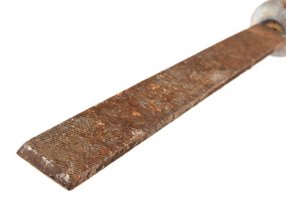 Close up of old and rusty work file.