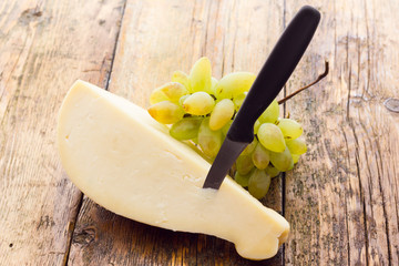 Slice of scamorza cheese from Italy