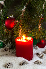 Burning red Candle during the holidays