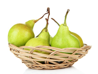 Pears in basket, isolated on white