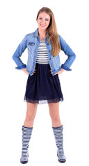 Beautiful young girl in skirt, jacket and t-shirt isolated
