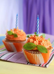Tasty cupcakes on table, close up
