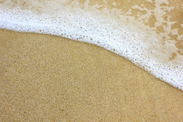 Clear sand of beach with ocean wave
