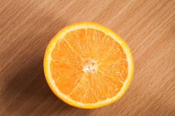 Fresh oranges on wooden table.