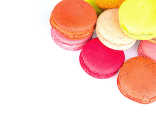French colorful macarons on white background